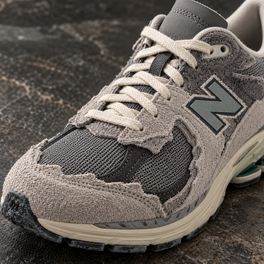 Close-up of sneaker materials, stitching and sole